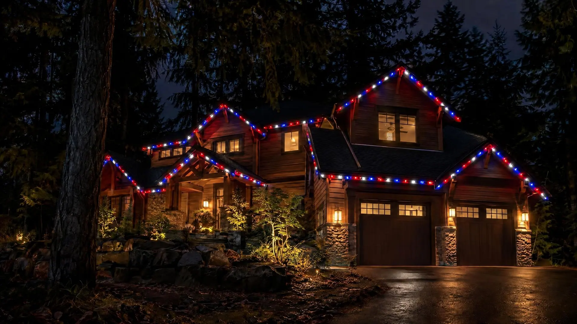A cedar cabin at night with red, white and blue roofline lights