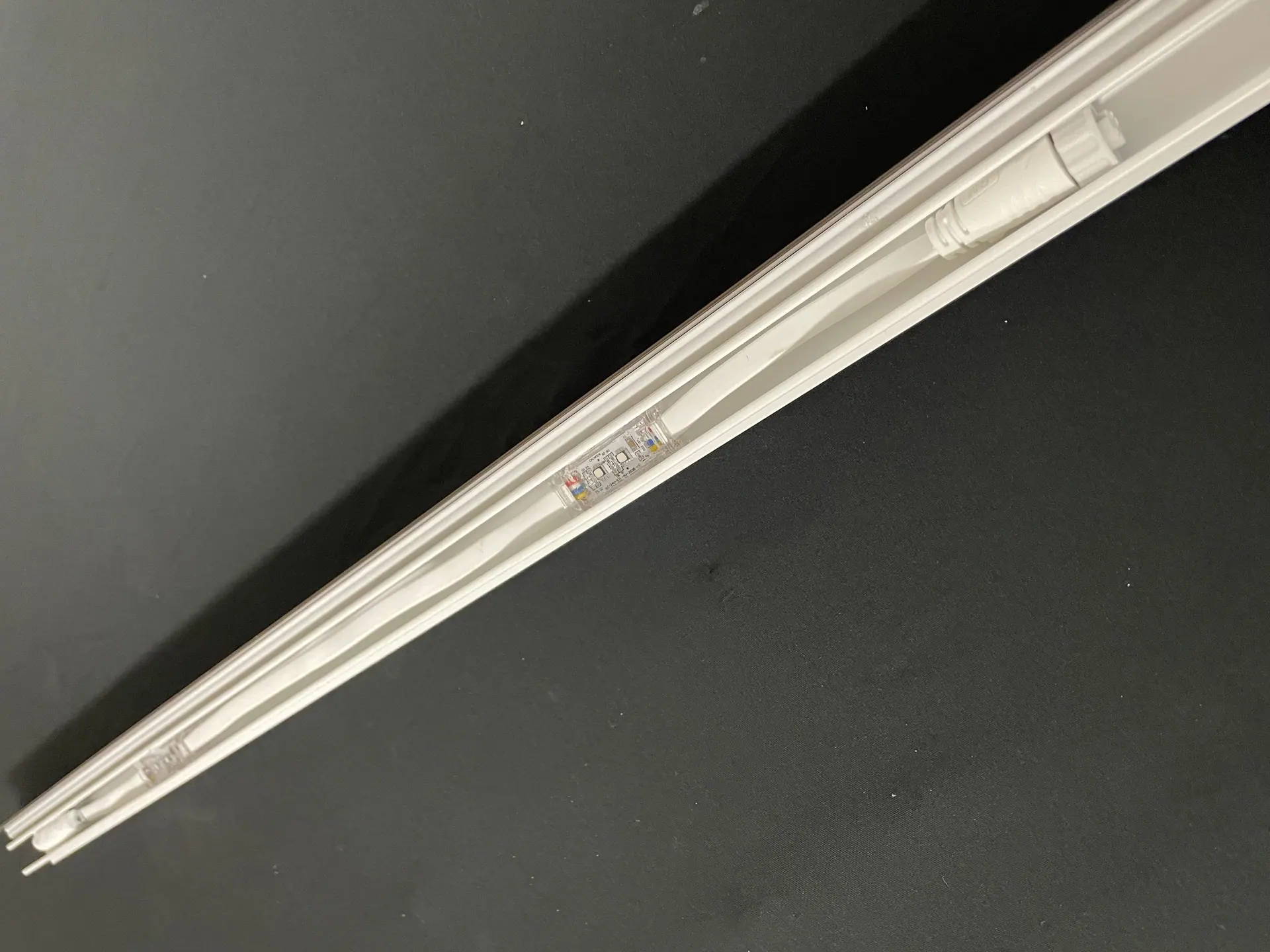 Minleon Pebble nodes recessed in an open white channel